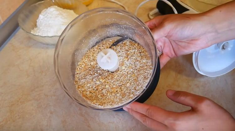 Gumiling otmil sa isang blender sa harina.